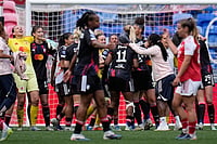 OL Lyonnes 3-1 Arsenal, UWCL: Holders Knocked Out After Jule Brand's Late Winner | Photo: AP/Laurent Cipriani : Lyonnes players celebrate at the end of the Women's Champions League semifinal, second leg, soccer match between OL Lyonnes and Arsenal, in Decines, outside Lyon, France.
