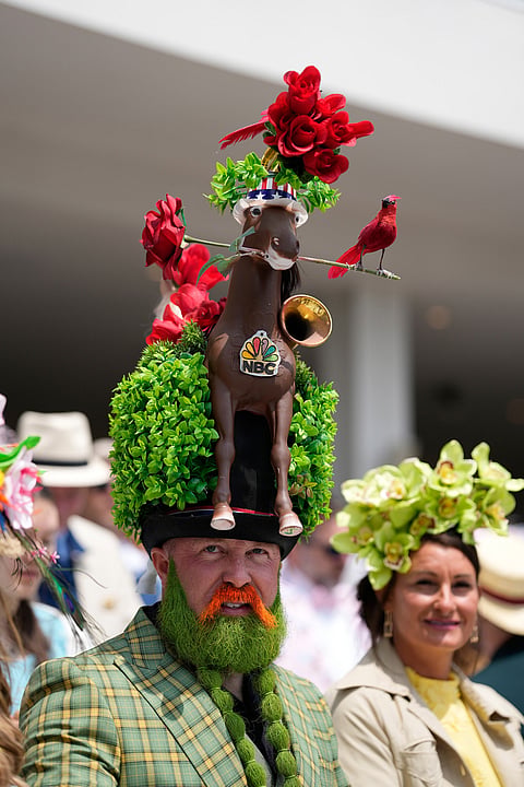 Garey Faulkner wears a hat before the 152nd running of the Kentucky Derby horse race at Churchill Downs, in Louisville, Kentucky.
