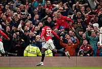 | Photo: AP/Dave Thompson : Manchester United's Kobbie Mainoo celebrates after scoring his side's third goal during the English Premier League soccer match between Manchester United and Liverpool in Manchester, England.