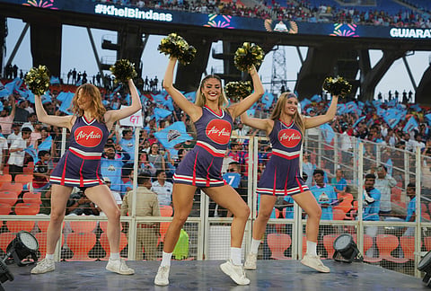 Cheer leaders dance before the Indian Premier League cricket match between Gujarat Titans and Punjab Kings in Ahmedabad.