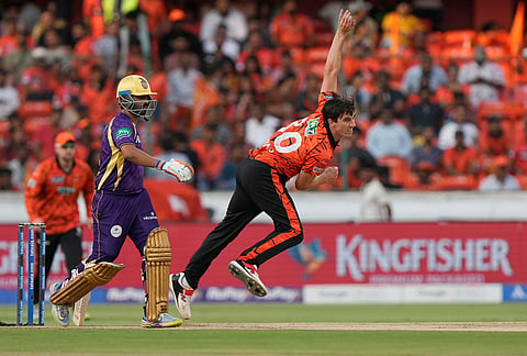 Sunrisers Hyderabad's captain Pat Cummins bowls a delivery during the Indian Premier League cricket match between Sunrisers Hyderabad and Kolkata Knight Riders in Hyderabad.