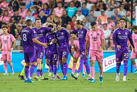 Orlando City midfielder Martín Ojeda (10) celebrates a goal with team players, Braian Ojeda (8), Iván Angulo (77), Adrián Marín (3), Griffin Dorsey (24), and Eduard Atuesta (20) in the second half during an MLS soccer match against the Inter Miami, in Miami.