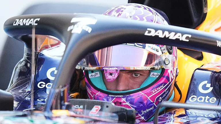 Red Bull driver Max Verstappen of the Netherlands leaves pit row during the qualifying session of the of the Miami Formula One Grand Prix auto race, Saturday, May 2, 2026, in Miami Gardens, Fla. - (AP Photo/Rebecca Blackwell, Pool)