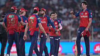 AP/Ajit Solanki : Marco Jansen, right, celebrates the wicket of Rahul Tewatia with teammates during the Indian Premier League match between Gujarat Titans and Punjab Kings in Ahmedabad.