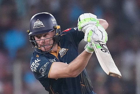 Gujarat Titans' Jos Buttler hits a six during the Indian Premier League cricket match between Gujarat Titans and Punjab Kings in Ahmedabad.