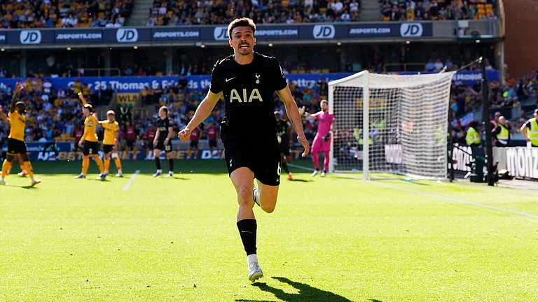 Tottenham Hotspur's Joao Palhinha celebrates scoring during the English Premier League soccer match between Wolverhampton Wanderers and Tottenham Hotspur in Wolverhampton, England. - AP Photo