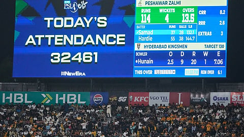 A message about crowd turnout displays on the big screen during the Pakistan Super League final between Peshawar Zalmi and Hyderabad Kingsmen, in Lahore.
