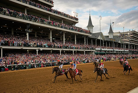 Golden Tempo, left, ridden by Jose L. Ortiz wins the 152nd running of the Kentucky Derby horse race at Churchill Downs, in Louisville, Kentucky .