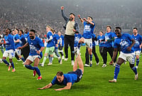 | Photo: AP/Martin Meissner : Schalke's head coach Miron Muslic celebrates with his players after FC Schalke 04 secured promotion to the German Bundesliga by winning the Bundesliga 2 match against Fortuna Duesseldorf at the Arena in Gelsenkirchen, Germany.