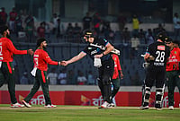 Bangladesh Vs New Zealand, 3rd T20I: Jacobs' Maiden Fifty Steers BlackCaps To Series-Levelling Win | Photo: AP/Mosaraf Hossain : New Zealand's Bevon Jacobs shakes hands with Bangladesh's players after winning the third T20 international cricket match between Bangladesh and New Zealand in Mirpur, Bangladesh.