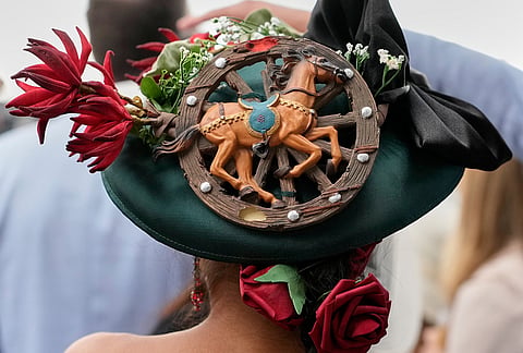 A woman wears a hat before the 152nd running of the Kentucky Derby horse race at Churchill Downs in Louisville, Kentucky.