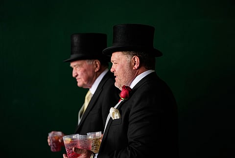 Fans head to the grandstand before the 152nd running of the Kentucky Derby horse race at Churchill Downs, in Louisville, Kentucky.
