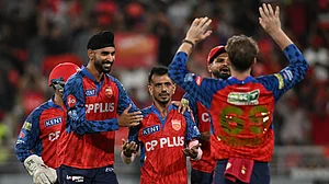 AP : Yuzvendra Chahal, centre, celebrates with teammates the wicket of Yashasvi Jaiswal during the Indian Premier League match between Rajasthan Royals and Punjab Kings in New Chandigarh.
