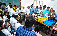 PTI : Poll officials during the counting of votes for the Puducherry Assembly elections at a counting centre, in Puducherry.