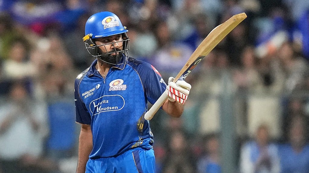 Rohit Sharma celebrates his fifty runs during the Indian Premier League match between Mumbai Indians and Lucknow Super Giants in Mumbai. - AP/Rafiq Maqbool