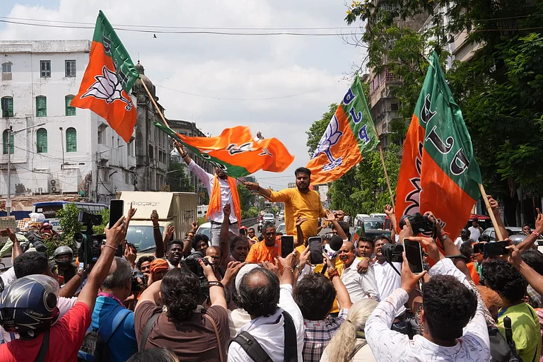 BJP workers celebrate as trends show the party leading in the West Bengal Assembly elections, in Kolkata. - | Photo: Sandipan Chatterjee/Outlook