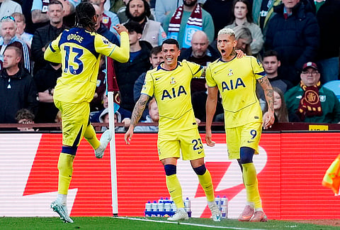 Tottenham's Richarlison, right, celebrates scoring their side's second goal during the English Premier League soccer match between Aston Villa and Tottenham Hotspur in Birmingham, England.