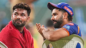 PTI/Kunal Patil : Mumbai Indians' Rohit Sharma, right, and Lucknow Super Giants' Rishabh Pant during a training session ahead of their Indian Premier League match in Mumbai.