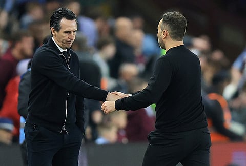 Tottenham Hotspur manager Roberto de Zerbi, right, and Aston Villa manager Unai Emery shake hands after the English Premier League soccer match between Aston Villa and Tottenham Hotspur in Birmingham, England.