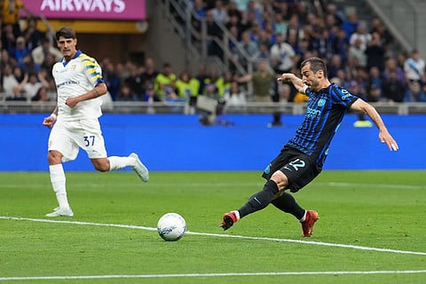 Inter Milan's Henrikh Mkhitaryan, right, scores his side's second goal during a Serie A soccer match between Inter Milan and Parma, in Milan, Italy.