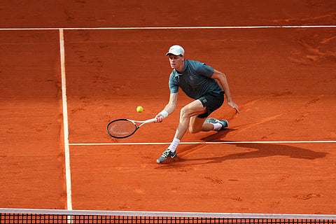 Jannik Sinner, of Italy, returns the ball to Alexander Zverev, of Germany, during their men's singles tennis final match at the Madrid Open tennis tournament in Madrid, Spain,.
