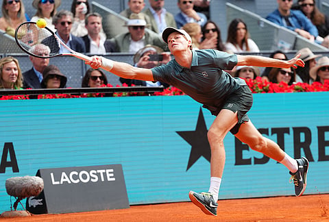 Jannik Sinner, of Italy, returns the ball to Alexander Zverev, of Germany, during their men's singles tennis final match at the Madrid Open tennis tournament in Madrid, Spain.