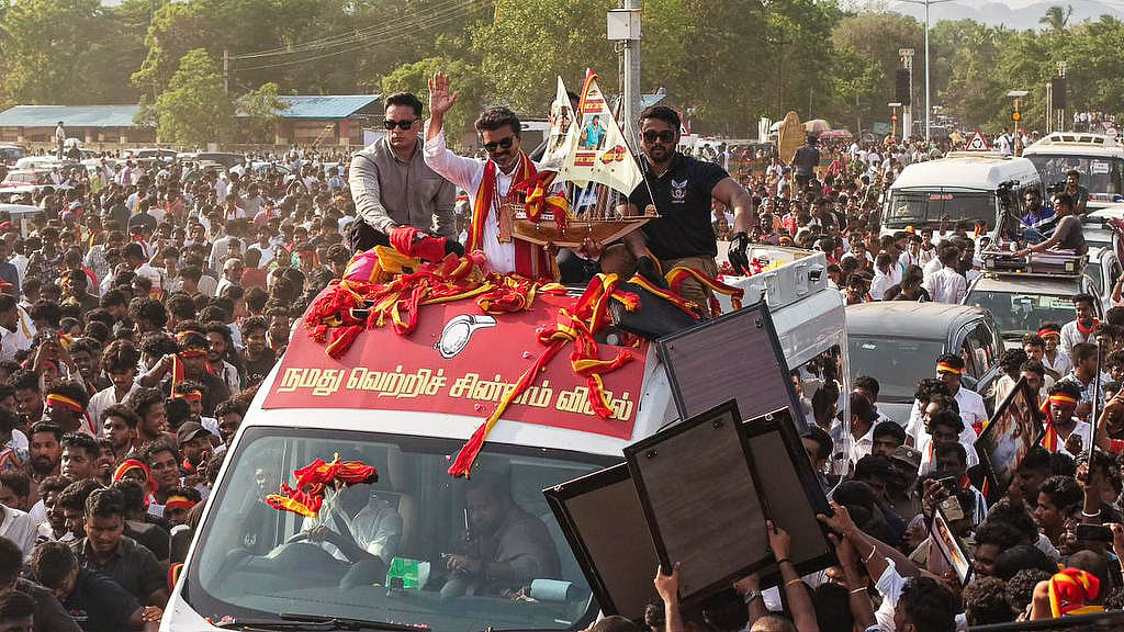 Indian Politics All eyes on Vijay the renowned film actor - The renowned actor-turned-politician Vijay amidst a sea of supporters and enthusiastic public crowd, during his election campaign at Kanya Kumari.  - null