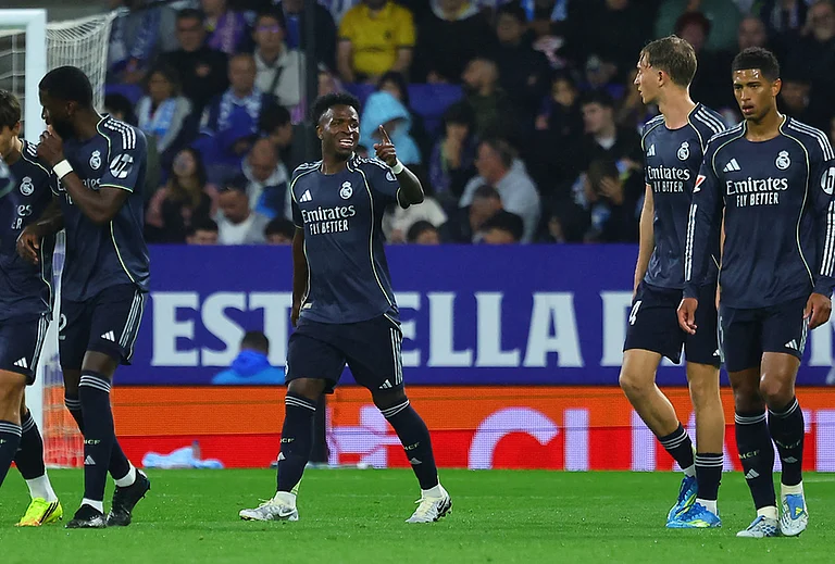 Real Madrid's Vinicius Junior celebrates after scoring during the La Liga soccer match between Espanyol and Real Madrid in Barcelona Spain. - | Photo: AP