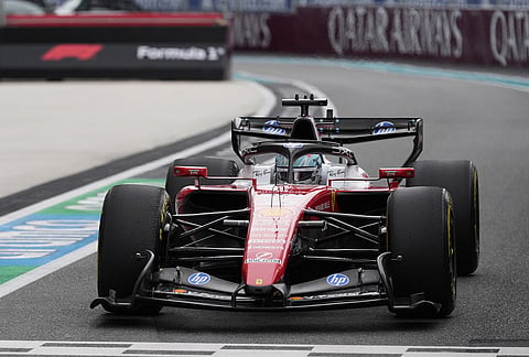 Ferrari driver Charles Leclerc of Monaco enters the pit area during the Miami Formula One Grand Prix auto race, in Miami Gardens, Florida.