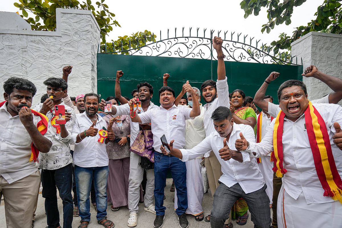 TVK supporters celebrate during vote counting in Chennai - - PTI