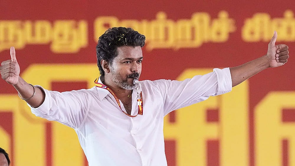 Tamilaga Vettri Kazhagam (TVK) chief Vijay during a public meeting ahead of the Tamil Nadu Assembly elections, in Chennai. - | Photo: PTI/R Senthilkumar