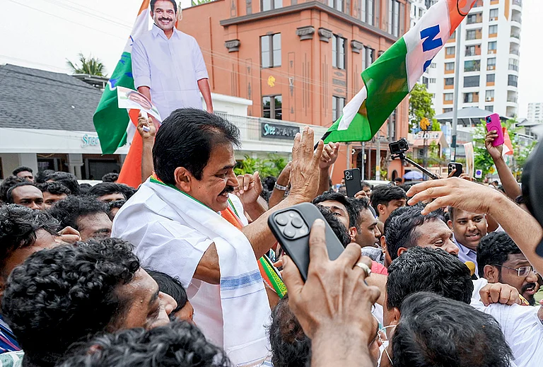 Congress MP KC Venugopal celebrates with party workers as the party takes lead during the Kerala Assembly elections result day outside KPCC office, in Thiruvananthapuram. - | Photo: PTI