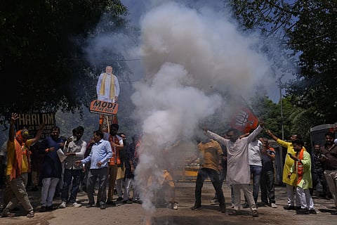 BJP supporters celebrate in BJP Delhi office