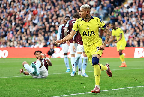 Tottenham's Richarlison celebrates scoring their side's second goal during the English Premier League soccer match between Aston Villa and Tottenham Hotspur in Birmingham, England.