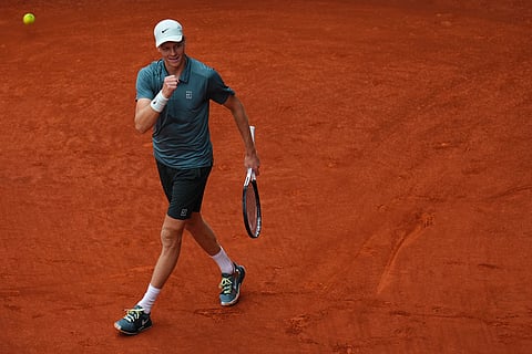 Jannik Sinner, of Italy, celebrates after winning the men's singles tennis final match against Alexander Zverev, of Germany, at the Madrid Open tennis tournament in Madrid, Spain.
