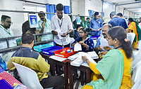 | Photo: PTI : Election officials count postal ballots during the first round of vote counting for the Assembly elections at a counting centre, in Kozhikode, Kerala.