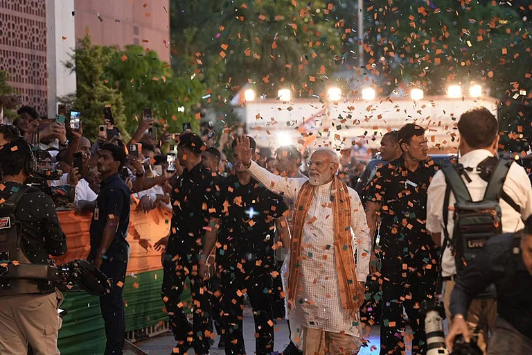 Prime Minister Narendra Modi arrives at the BJP headquarters to celebrate the party's performance in Assembly elections across four states and one union territory, in New Delhi. - Photo: Tribhuvan Tiwari