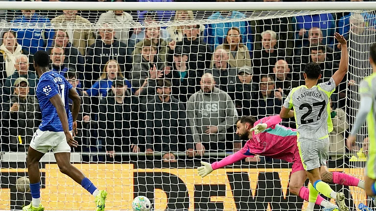 Everton's Thierno Barry scores during the Premier League soccer match between Manchester City and Everton in Liverpool, England, Monday. - AP Photo