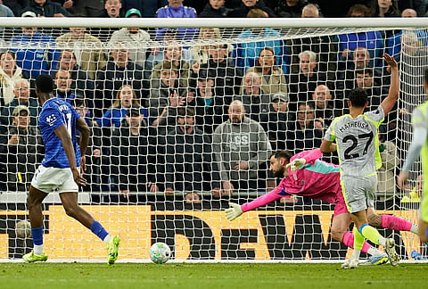 Everton's Thierno Barry scores during the Premier League soccer match between Manchester City and Everton in Liverpool, England.