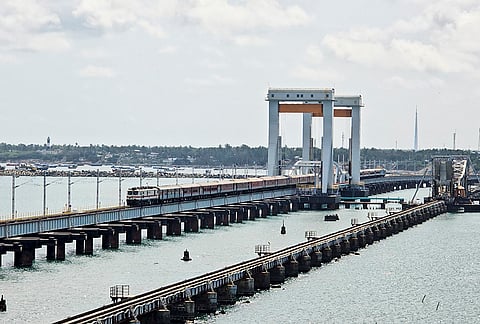 A train passes over the New Pamban Bridge, in Rameswaram, Tamil Nadu. 