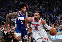 | Photo: AP/Seth Wenig : New York Knicks' Jalen Brunson, right, drives past Philadelphia 76ers' Kelly Oubre Jr. during the first half of Game 1 in a second-round NBA basketball playoffs series in New York. 