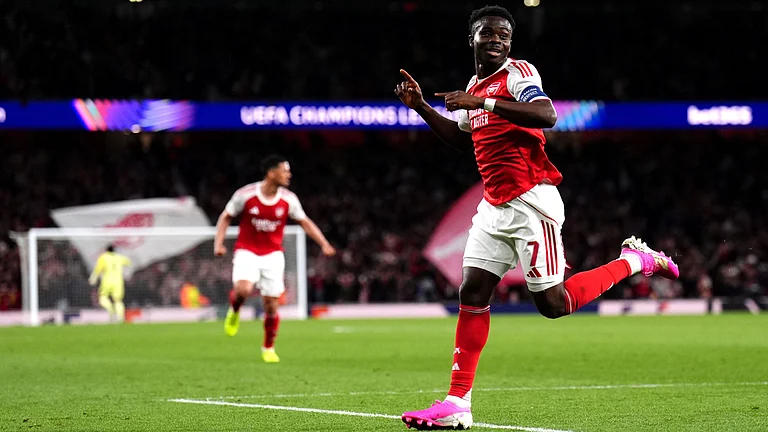 Arsenal's Bukayo Saka celebrates after scoring the opening goal during a Champions League semifinal, second leg, soccer match between Arsenal FC and Atletico Madrid in London. - AP Photo