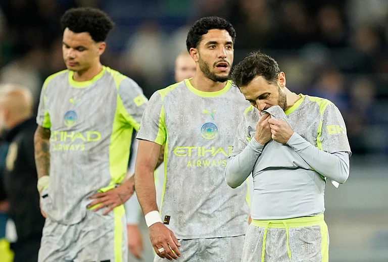 Manchester City's Bernardo Silva, right, reacts after the Premier League soccer match between Manchester City and Everton in Liverpool, England. - | Photo: AP/Dave Thompson