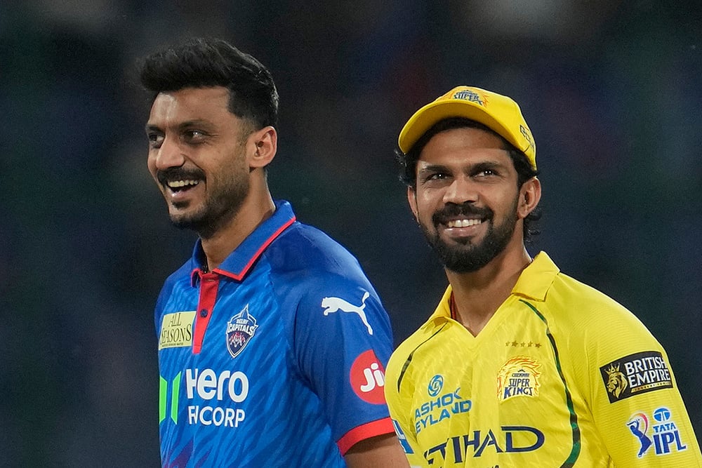 Chennai Super Kings' captain Ruturaj Gaikwad, right, and Delhi Capitals' captain Axar Patel before the Indian Premier League cricket match between Chennai Super Kings and Delhi Capitals in New Delhi, India. - | Photo: AP/Manish Swarup