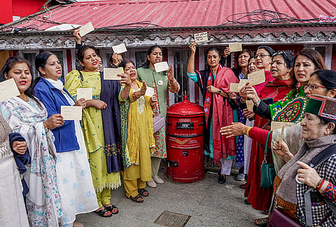 All India Mahila Congress (AIMC) President Alka Lamba along with party workers send postcards addressed to the Prime Minister Narendra Modi during a nationwide campaign demanding implementation of the 'Nari Shakti Vandan Adhiniyam 2023', in Shimla, Himachal Pradesh.