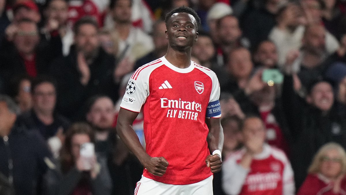Arsenal's Bukayo Saka celebrates after scoring the opening goal during a Champions League semifinal, second leg, soccer match between Arsenal FC and Atletico Madrid in London. - AP Photo
