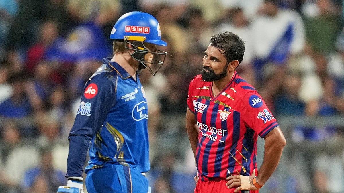 Lucknow Super Giants' Mohammed Shami, right, reacts after Mumbai Indians' Ryan Rickelton hits a boundary during the Indian Premier League cricket match between Mumbai Indians and Lucknow Super Giants in Mumbai, India, Monday, May 4, 2026. - (AP Photo/Rafiq Maqbool)