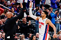 | Photo: AP/Duane Burleson : Detroit Pistons forward Tobias Harris (12) celebrates with head coach J.B. Bickerstaff, left, as he leaves late in the fourth quarter of a win over the Orlando Magic in Game 7 of a first-round NBA basketball playoffs series in Detroit.