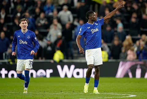 Everton's Thierno Barry celebrates after scoring during the Premier League soccer match between Manchester City and Everton in Liverpool, England.