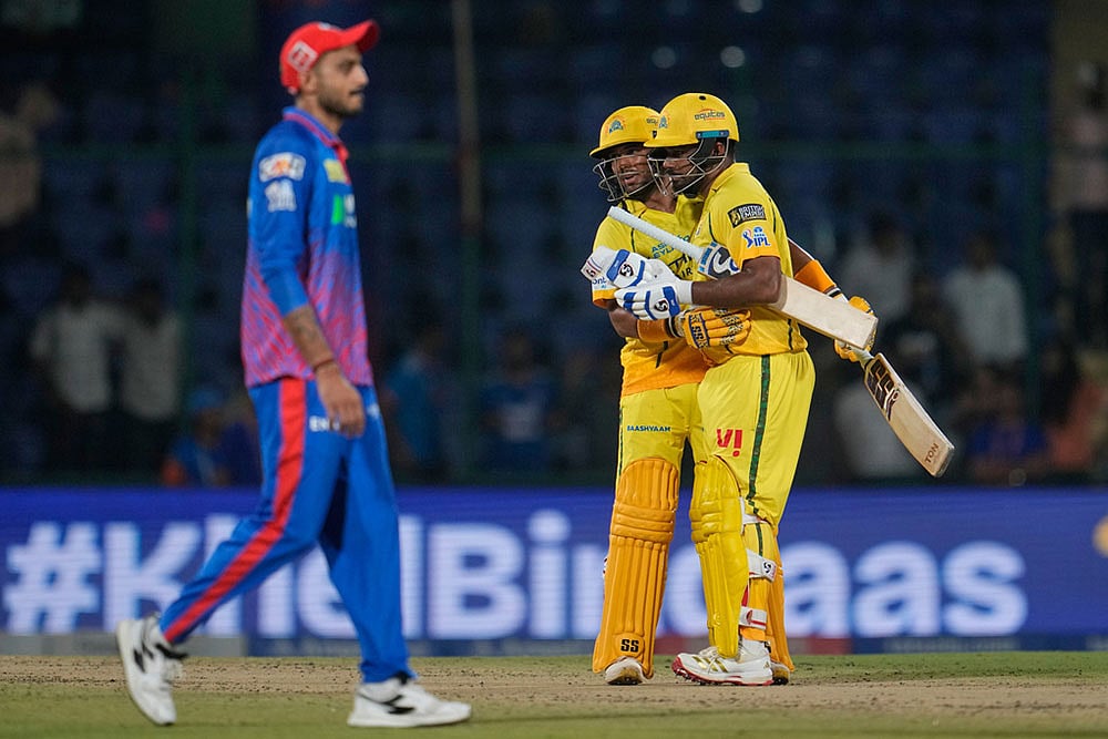 | Photo: AP/Manish Swarup : Chennai Super Kings' Kartik Sharma and Sanju Samson celebrate their win in the Indian Premier League cricket match between Chennai Super Kings and Delhi Capitals in New Delhi, India.